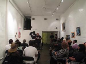 Terri Shrum Stoor reading at Sunday Shorts, May 12, 2013. Photo by Wayne Edelen.