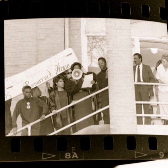 Student protesters on the steps of the steps of the Education Building, Selma City Schools , January 8, 1990, with Superintendent Dr. Norward Roussell looking on. (Photo by Patricia Cavanaugh McCarter)